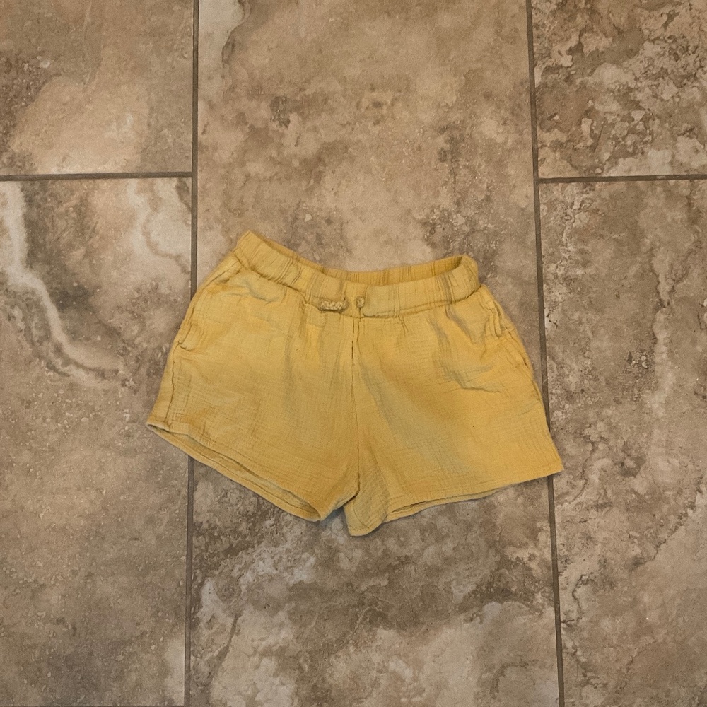 Yellow shorts with gold tinsel